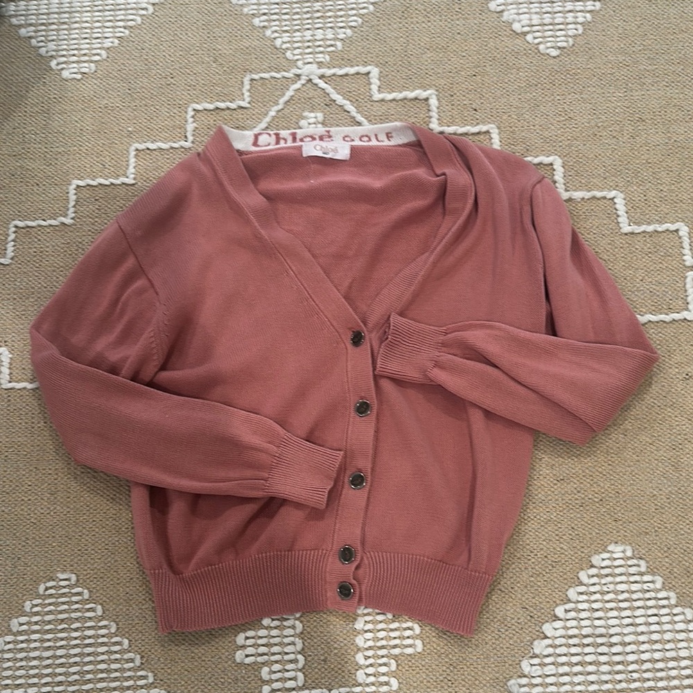Chloe golf sweater size small/medium